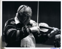 Isaac Stern playing the violin, 1986 [descriptive]