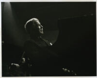 Artur Schnabel playing piano in performance, 1947 [descriptive]