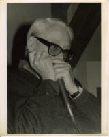 Toots Thielemans on harmonica, Los Angeles [descriptive]