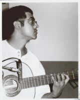 Fareed Haque playing guitar, Los Angeles [descriptive]