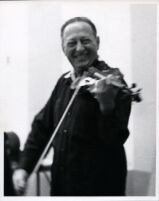 Jascha Heifetz playing the violin, 1966 [descriptive]