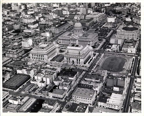 [Aerial view of Civic Center district]