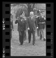 President Lyndon B. Johnson and Upper Voltian President Maurice Yaméogo waving, 1965 [15A]