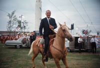 President Lyndon B. Johnson rides a horse during a 1964 presidential campaign event
