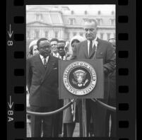 President Lyndon B. Johnson at podium with Upper Voltian President Maurice Yaméogo, 1965 [8_1]