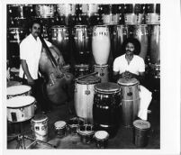 Roberto Miranda and Virgilio Figueroa at Gon-Bop drum factory [descriptive]