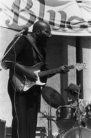 Johnny Heartsman playing guitar at the San Francisco Blues Festival, 1977 [descriptive]