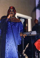 Sun Ra at the microphone in Oakland, California, 1985 [descriptive]