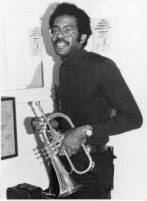 George Sams with his cornet, 1978 [descriptive] — Calisphere