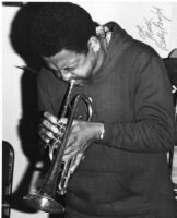 Autographed photo of Bobby Bradford playing trumpet, 1976 [descriptive]