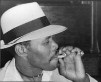 Mississippi Smokey Wilson smoking a cigarette, 1978 [descriptive]