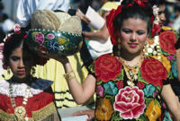 Tehuantepec, woman holding bowl of bread, 1982 or 1985