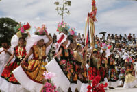 Juchitan, women holding gourd bowls and flowers on heads, 1982 or 1985