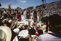 Tehuantepec, performers throwing gifts to spectators, 1982 or 1985