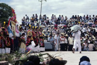 Tehuantepec, man carrying fake fish on shoulder, 1982 or 1985