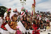 Juchitan, women holding gourd bowls and flowers on heads, 1982 or 1985