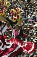 Chines de Oaxaca, woman dancing with flower basket on head [blurred], 1982