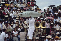 Tehuantepec, man carrying fake fish, 1982 or 1985