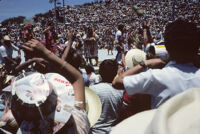 Tuxtepec, performers throwing gifts to spectators, 1985