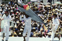 Tehuantepec, man carrying fake fish, 1982 or 1985