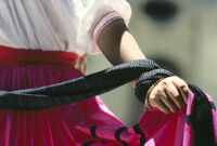 Ejutla de Crespo, hand holding skirt close-up, 1982