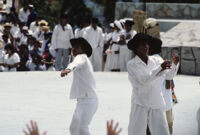 Betaza, performers throwing gifts to spectators, 1982 or 1985