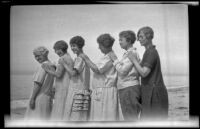 Mrs. Culp, Edith Shaw, Mertie Whitaker, Zetta Witherby, Josie Shaw and Agnes Whitaker posing on the beach, Carpinteria vicinity, about 1924