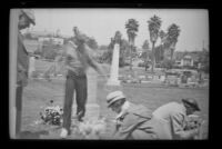 Members of the West family tend to George M. West and Wilhelmina West's graves, Los Angeles, 1936