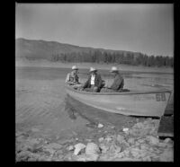 Forrest Whitaker, H. H. West and Wayne West sit in a boat on Big Bear Lake, Big Bear Lake, 1945