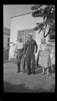 Romayne Shaw, Richard Shaw and Edith Shaw pose in the backyard of W. H. Shaw's home, Los Angeles, 1946