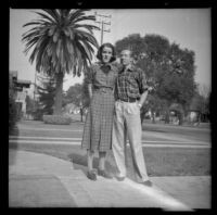 H. H. West Jr. and Jane Deming stand in front of the West's house, Los Angeles, 1937