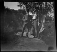 Wilfrid and Harriet Cline stand on a path at Elysian Park, Los Angeles, about 1904