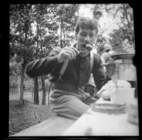 Independence (Inda) Stevens eats a preserved crab apple, Elliott vicinity, 1900