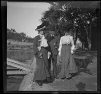 Wilfrid and Harriet Cline and Mary West stand by the reservoir at Elysian Park, Los Angeles, about 1904