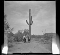 Agnes Whitaker, Forrest Whitaker and Mertie West in front of a cactus during a trip to Mexico, 1948