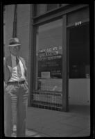 Ralph B. Clapp poses outside his office, Los Angeles, 1939