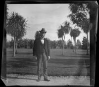 Dr. Bim Smith stands in Lincoln (Eastlake) Park, Los Angeles, 1899