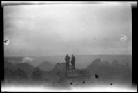 Two of the H. H. West vacation group at Bright Angel Point in the Grand Canyon, 1923