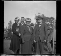 Sam and Cosette Longstreet stand with Mr. and Mrs. Harris at the Iowa Picnic in Lincoln Park, Los Angeles, 1940