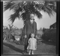 Abraham Whitaker and his great-granddaughter, Shirleyana Shaw in Alhambra Park, Alhambra, about 1930