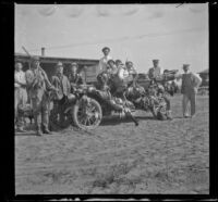 Members of the Cazadores Gun Club pose for a photograph around F. S. Hardin's Regal, Orange County vicinity, 1909