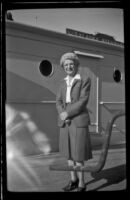 Mertie West poses on the ship's top deck, Seattle vicinity, 1946