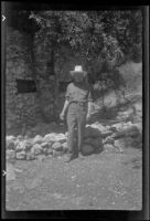 H. H. West posing in a cowboy hat, San Gabriel Mountains, 1941