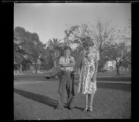 Richard and Dorothea Siemsen stand on the West's front lawn, Los Angeles, 1939