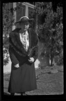 Hattie M. Cline poses for a photograph outside the Siemsen's residence, Glendale, 1939