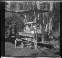 Mertie West and Edith Shaw next to a temporary camping kitchen at Convict Lake, Mammoth Lakes vicinity, 1929