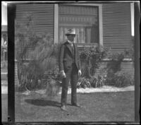 Wayne West stands in front of the West's house at 240 South Griffin Avenue, Los Angeles, 1897