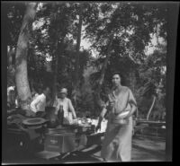 Mildred Keithler cleans up after a picnic in Victory Park, Los Angeles, 1931