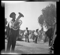 Marching band prepares for the Decoration Day Parade as spectators look on, Glendale, 1937