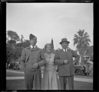 H. H. West poses with his wife and son, Los Angeles, 1941 — Calisphere